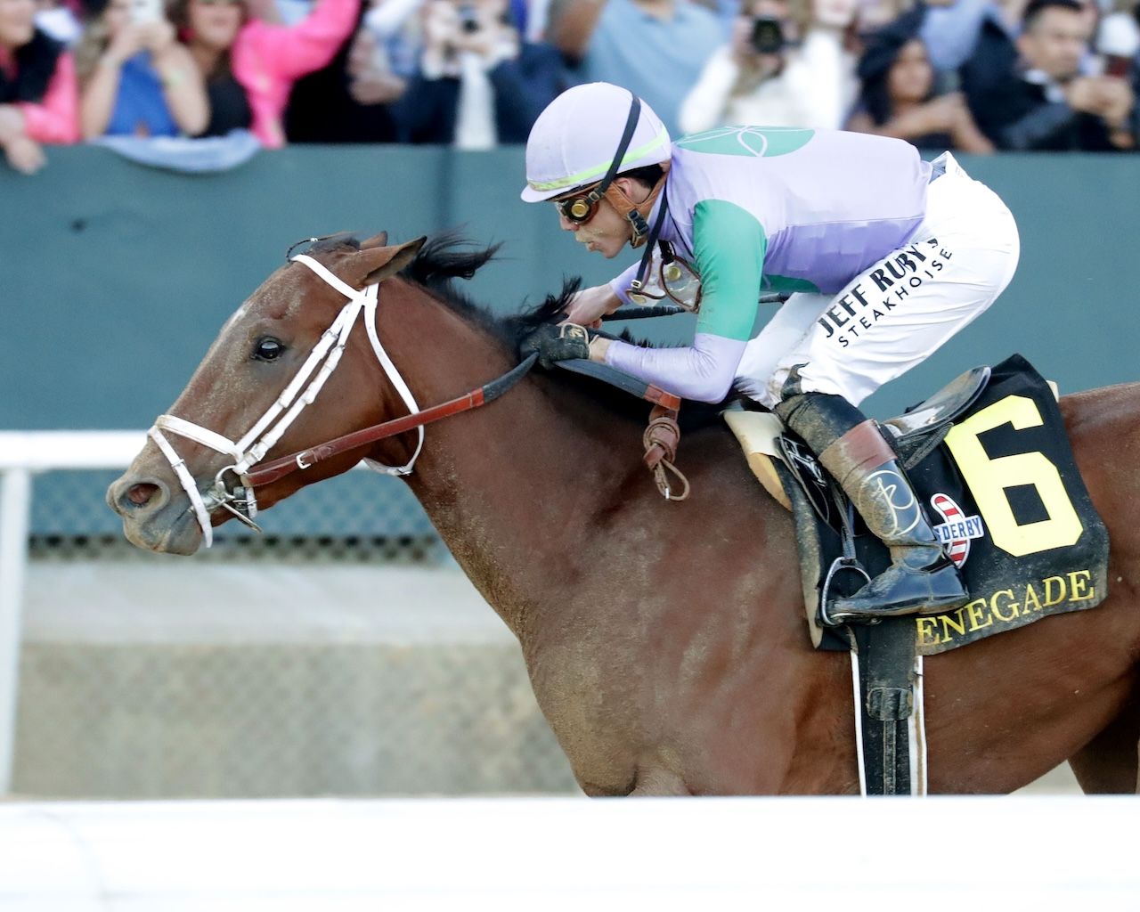Renegade wins the Arkansas Derby at Oaklawn Park.